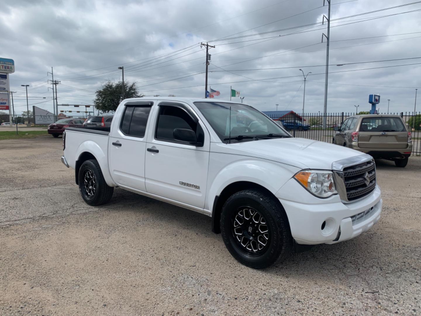 2012 White Suzuki Equator Sport Crew Cab 2WD (5Z61D0ER4CC) with an 4.0L V6 DOHC 24V engine, Automatic transmission, located at 1830 North Belt Line Road, Irving, TX, 75061, (469) 524-0199, 32.834373, -96.993584 - Photo#8